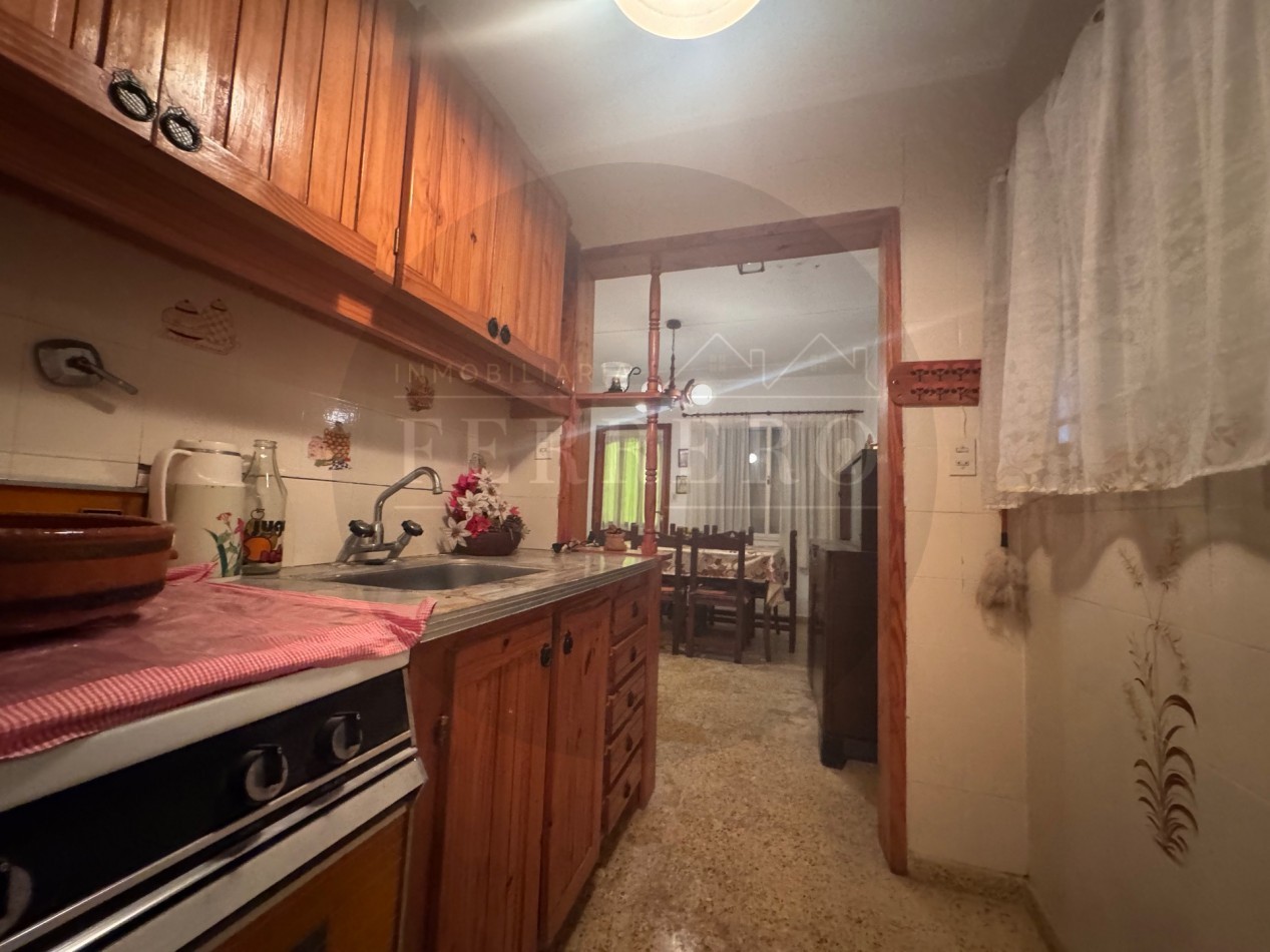 Propiedad Multifuncional con Tres Espacios Habitables y Gran Lote de 1.100m2