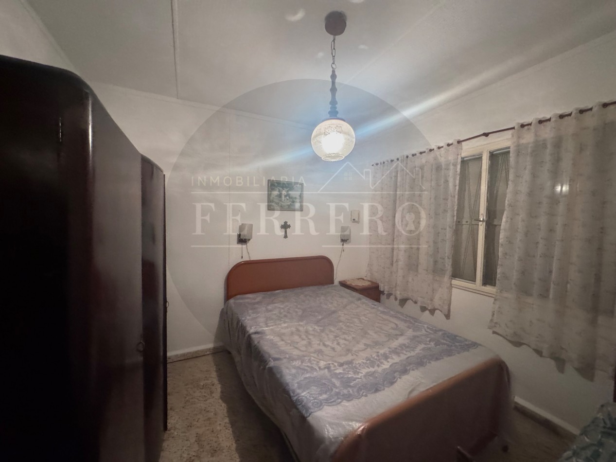 Propiedad Multifuncional con Tres Espacios Habitables y Gran Lote de 1.100m2