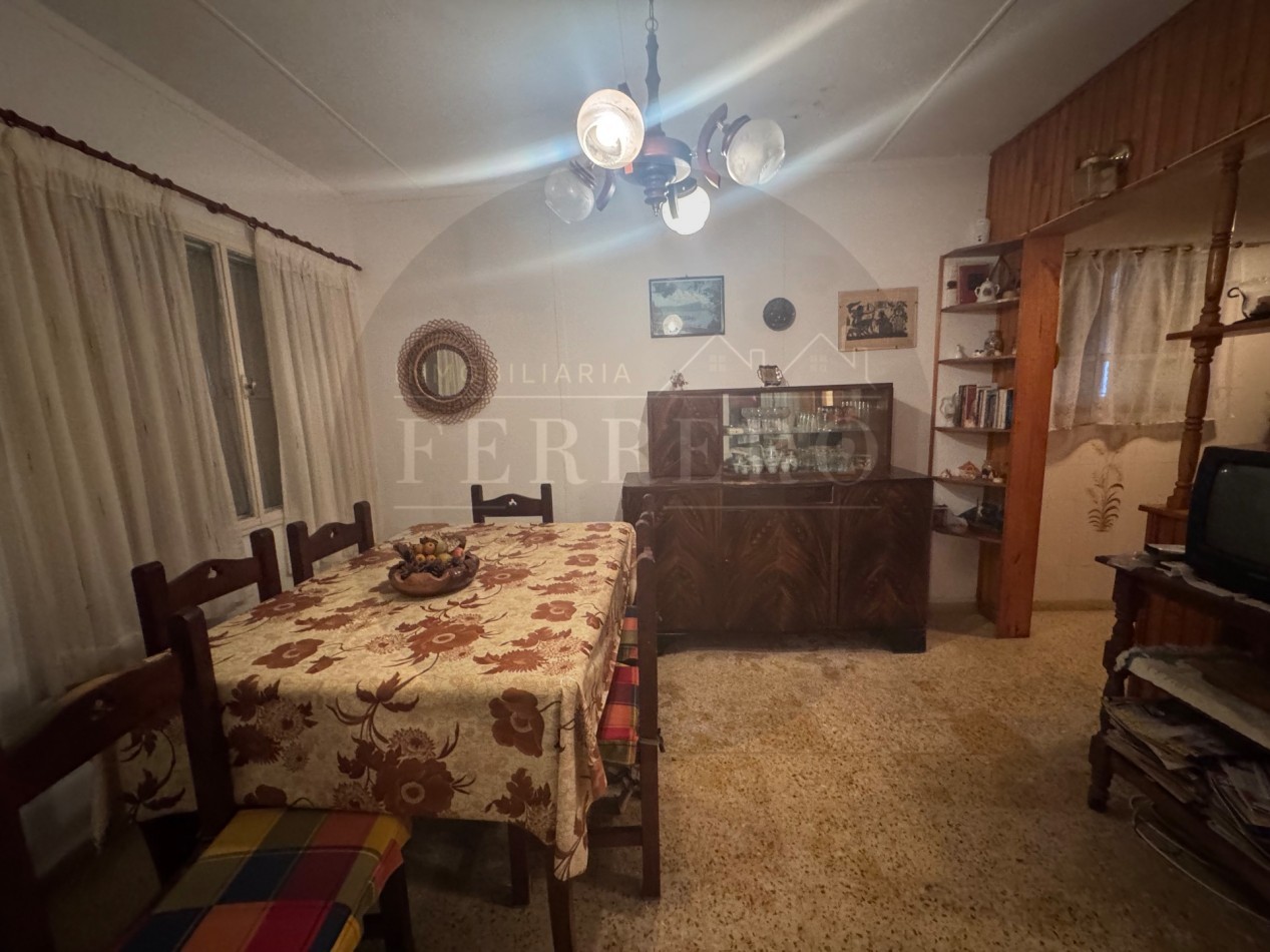 Propiedad Multifuncional con Tres Espacios Habitables y Gran Lote de 1.100m2
