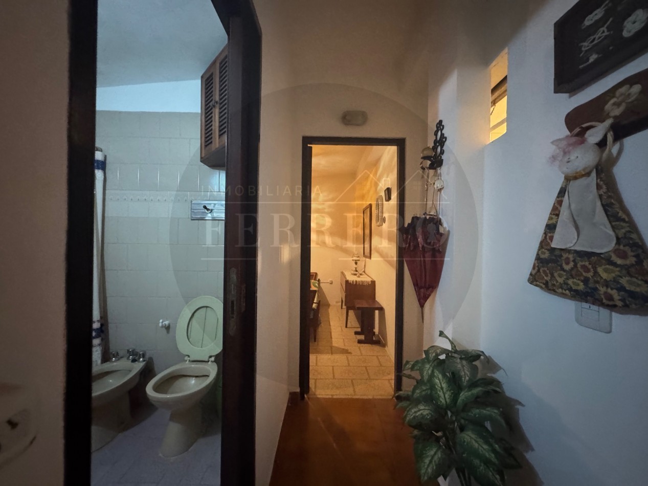 Propiedad Multifuncional con Tres Espacios Habitables y Gran Lote de 1.100m2