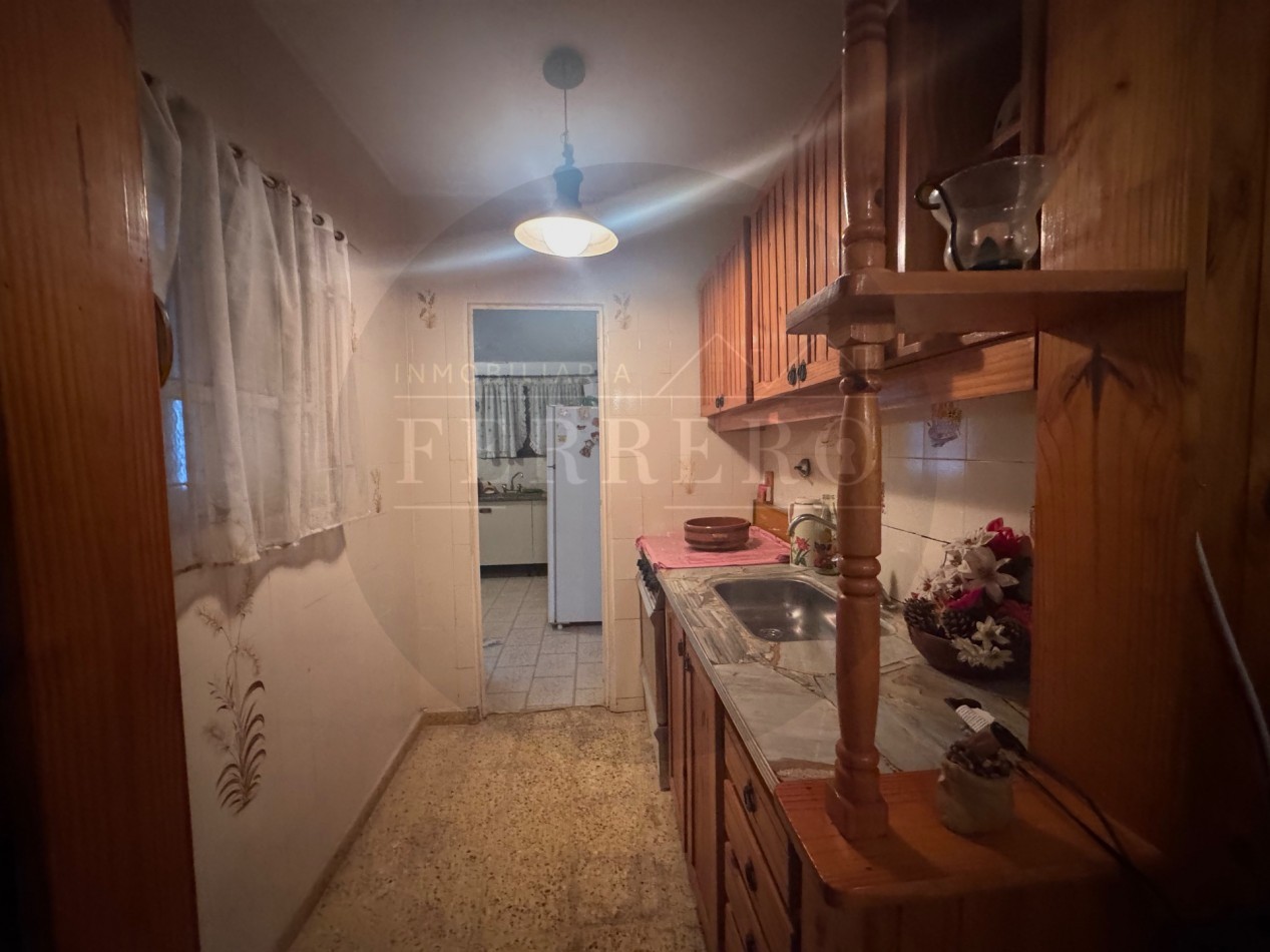 Propiedad Multifuncional con Tres Espacios Habitables y Gran Lote de 1.100m2