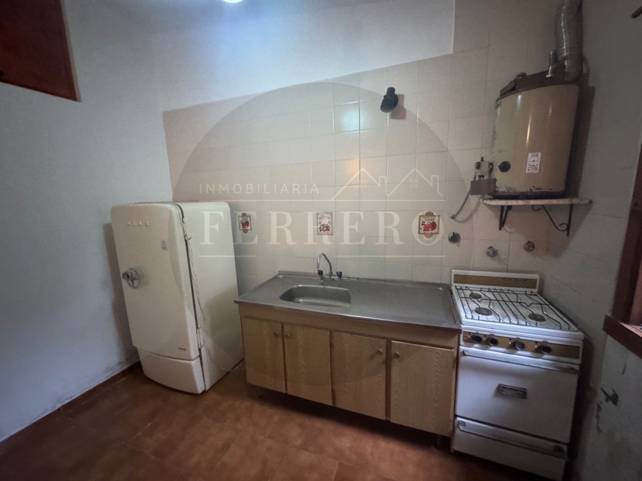 Propiedad Multifuncional con Tres Espacios Habitables y Gran Lote de 1.100m2