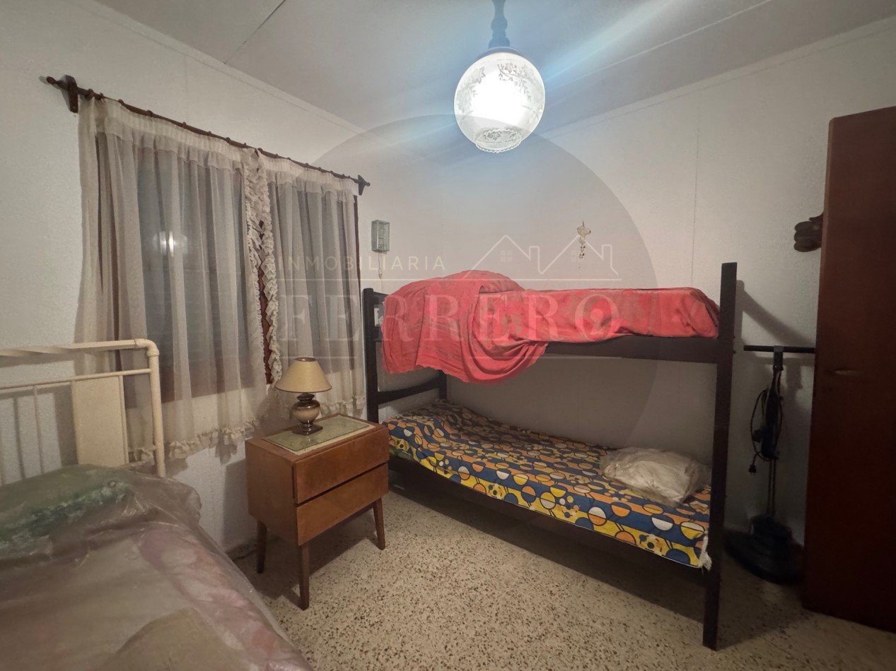 Propiedad Multifuncional con Tres Espacios Habitables y Gran Lote de 1.100m2