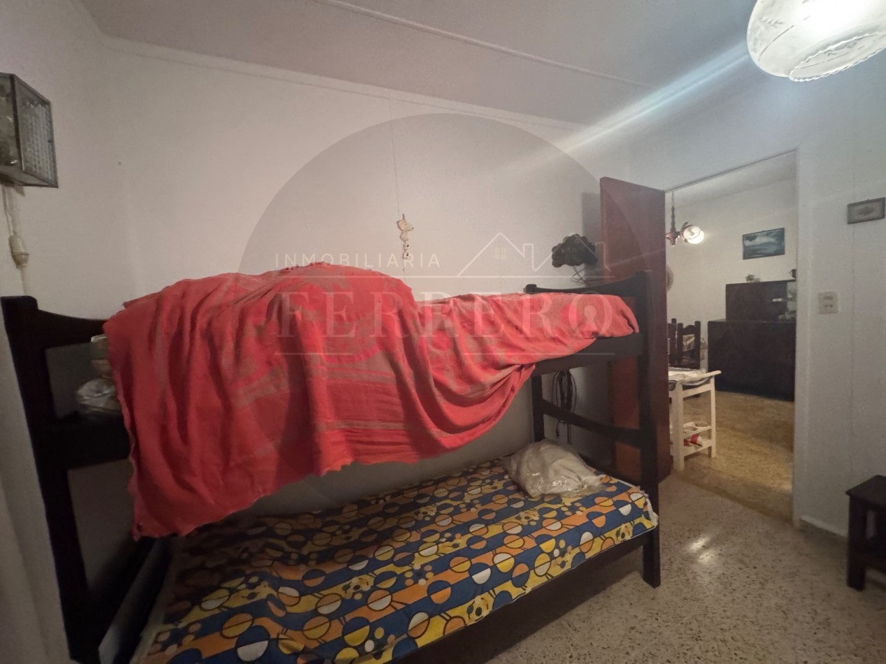 Propiedad Multifuncional con Tres Espacios Habitables y Gran Lote de 1.100m2