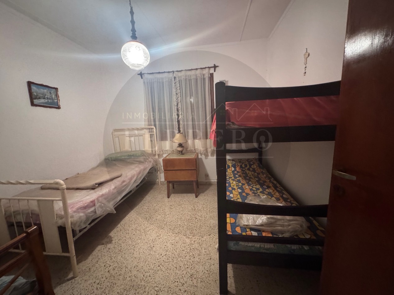Propiedad Multifuncional con Tres Espacios Habitables y Gran Lote de 1.100m2