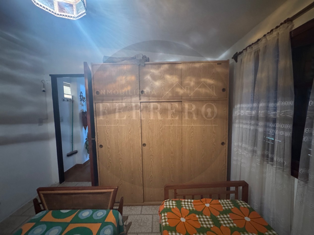 Propiedad Multifuncional con Tres Espacios Habitables y Gran Lote de 1.100m2