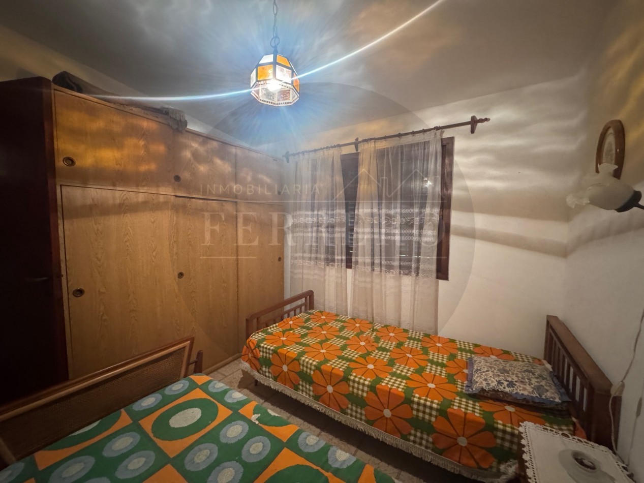 Propiedad Multifuncional con Tres Espacios Habitables y Gran Lote de 1.100m2
